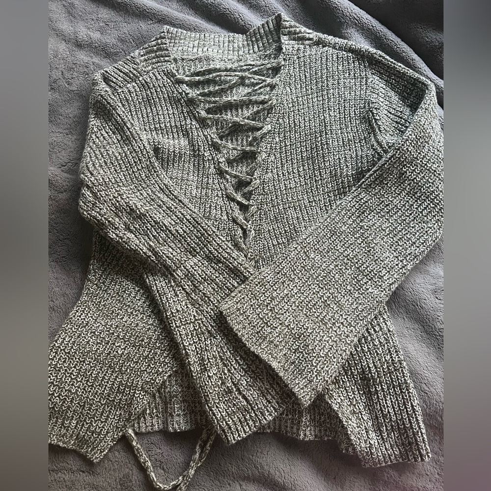 Open back green knit sweater